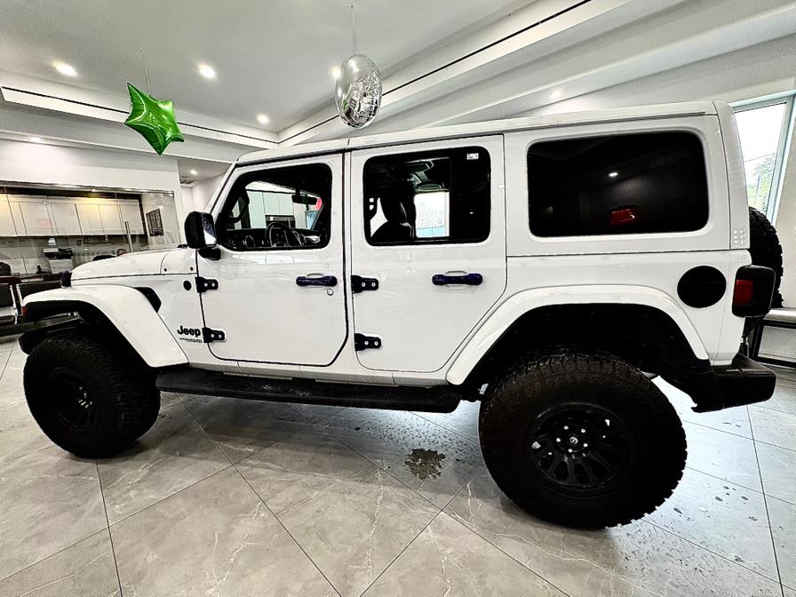 2022 Jeep Wrangler Unlimited Sahara Altitude 4x4, available for sale in Franklin Square, New York | Luxury Motor Club. Franklin Square, New York 2022 Jeep Wrangler Unlimited Sahara Altitude 4x4, available for sale in Franklin Square, New York | Luxury Motor Club. Franklin Square, New York
