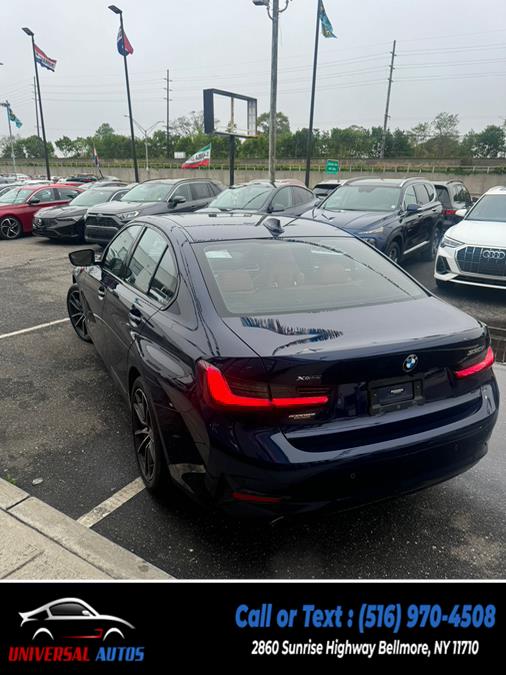 2022 BMW 3 Series 330i xDrive Sedan, available for sale in Bellmore, New York | Universal Autos. Bellmore, New York 2022 BMW 3 Series 330i xDrive Sedan, available for sale in Bellmore, New York | Universal Autos. Bellmore, New York