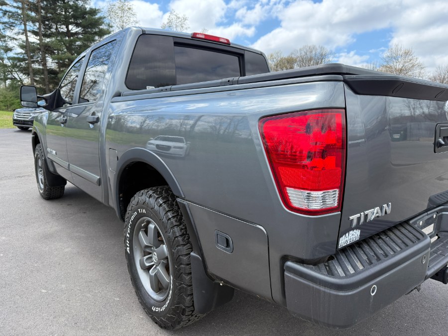 2015 Nissan Titan 4WD Crew Cab SWB SL, available for sale in Ortonville, Michigan | Marsh Auto Sales LLC. Ortonville, Michigan 2015 Nissan Titan 4WD Crew Cab SWB SL, available for sale in Ortonville, Michigan | Marsh Auto Sales LLC. Ortonville, Michigan