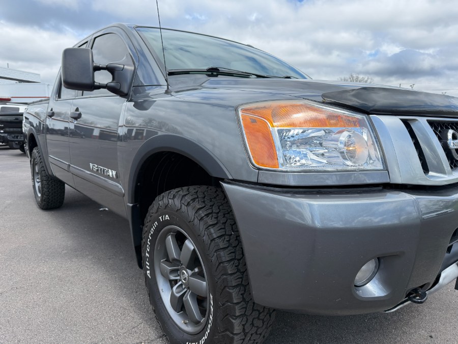2015 Nissan Titan 4WD Crew Cab SWB SL, available for sale in Ortonville, Michigan | Marsh Auto Sales LLC. Ortonville, Michigan 2015 Nissan Titan 4WD Crew Cab SWB SL, available for sale in Ortonville, Michigan | Marsh Auto Sales LLC. Ortonville, Michigan