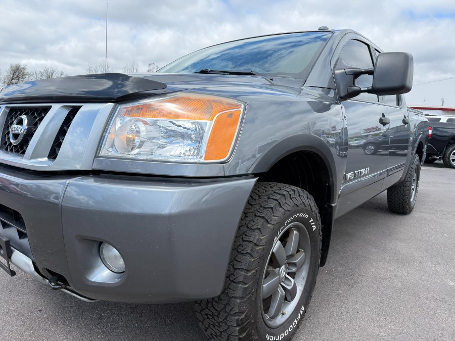 2015 Nissan Titan 4WD Crew Cab SWB SL, available for sale in Ortonville, Michigan | Marsh Auto Sales LLC. Ortonville, Michigan 2015 Nissan Titan 4WD Crew Cab SWB SL, available for sale in Ortonville, Michigan | Marsh Auto Sales LLC. Ortonville, Michigan
