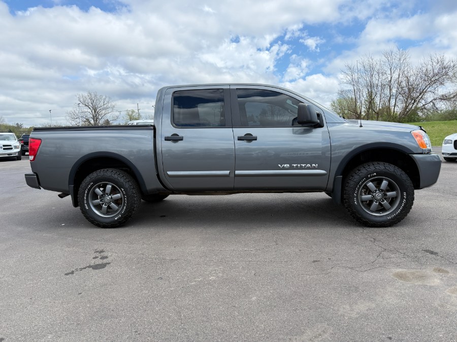 2015 Nissan Titan 4WD Crew Cab SWB SL, available for sale in Ortonville, Michigan | Marsh Auto Sales LLC. Ortonville, Michigan 2015 Nissan Titan 4WD Crew Cab SWB SL, available for sale in Ortonville, Michigan | Marsh Auto Sales LLC. Ortonville, Michigan