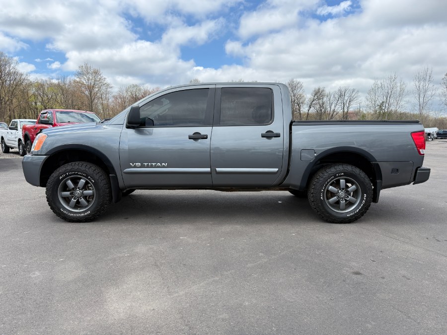 2015 Nissan Titan 4WD Crew Cab SWB SL, available for sale in Ortonville, Michigan | Marsh Auto Sales LLC. Ortonville, Michigan 2015 Nissan Titan 4WD Crew Cab SWB SL, available for sale in Ortonville, Michigan | Marsh Auto Sales LLC. Ortonville, Michigan