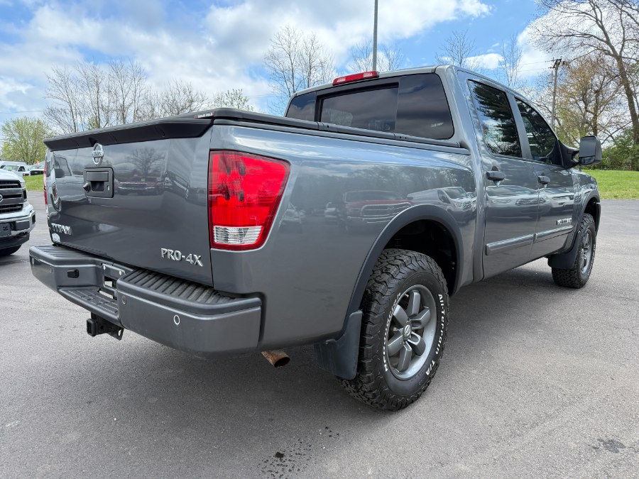 2015 Nissan Titan 4WD Crew Cab SWB SL, available for sale in Ortonville, Michigan | Marsh Auto Sales LLC. Ortonville, Michigan 2015 Nissan Titan 4WD Crew Cab SWB SL, available for sale in Ortonville, Michigan | Marsh Auto Sales LLC. Ortonville, Michigan