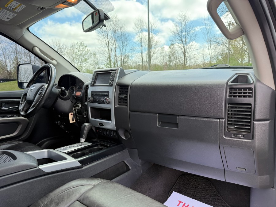 2015 Nissan Titan 4WD Crew Cab SWB SL, available for sale in Ortonville, Michigan | Marsh Auto Sales LLC. Ortonville, Michigan 2015 Nissan Titan 4WD Crew Cab SWB SL, available for sale in Ortonville, Michigan | Marsh Auto Sales LLC. Ortonville, Michigan