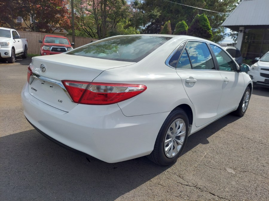 2016 Toyota Camry 4dr Sdn I4 Auto LE (Natl), available for sale in East Windsor, Connecticut | United Auto Sales of E Windsor, Inc. East Windsor, Connecticut 2016 Toyota Camry 4dr Sdn I4 Auto LE (Natl), available for sale in East Windsor, Connecticut | United Auto Sales of E Windsor, Inc. East Windsor, Connecticut