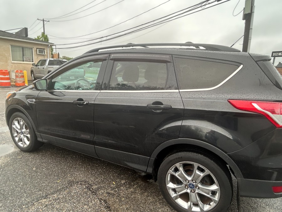 2013 Ford Escape 4WD 4dr SEL, available for sale in West Babylon, New York | New Gen Auto Group. West Babylon, New York 2013 Ford Escape 4WD 4dr SEL, available for sale in West Babylon, New York | New Gen Auto Group. West Babylon, New York