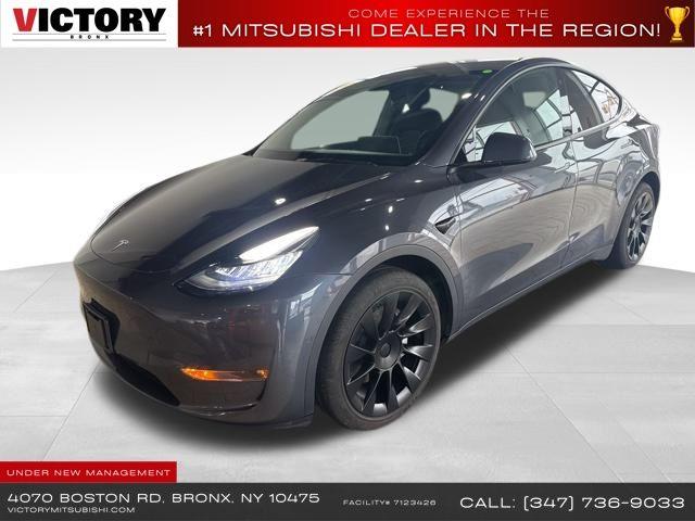 Used 2022 Tesla Model y in Floral Park, New York | Shop Auto NY. Floral Park, New York