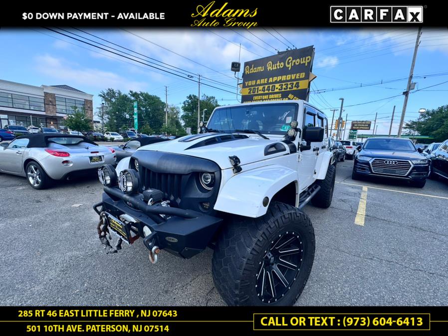 2016 Jeep Wrangler Unlimited 4WD 4dr Sahara, available for sale in Paterson, New Jersey | Adams Auto Group. Paterson, New Jersey 2016 Jeep Wrangler Unlimited 4WD 4dr Sahara, available for sale in Paterson, New Jersey | Adams Auto Group. Paterson, New Jersey