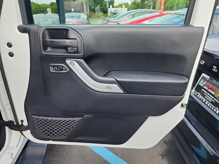 2016 Jeep Wrangler Unlimited 4WD 4dr Sahara, available for sale in Islip, New York | L.I. Auto Gallery. Islip, New York 2016 Jeep Wrangler Unlimited 4WD 4dr Sahara, available for sale in Islip, New York | L.I. Auto Gallery. Islip, New York