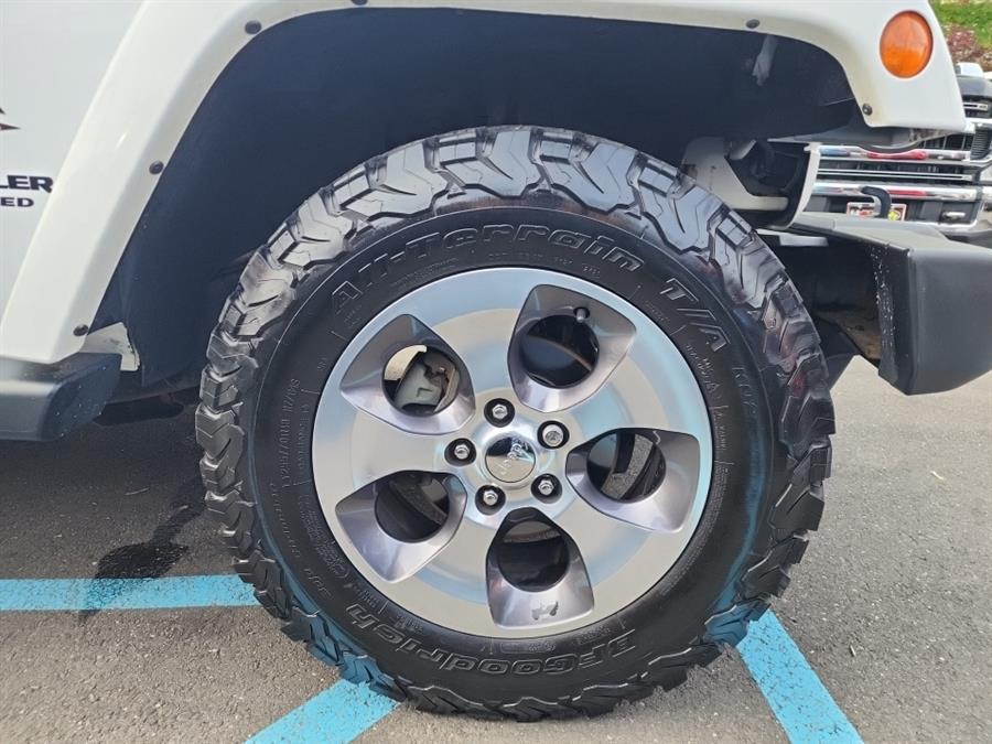 2016 Jeep Wrangler Unlimited 4WD 4dr Sahara, available for sale in Islip, New York | L.I. Auto Gallery. Islip, New York 2016 Jeep Wrangler Unlimited 4WD 4dr Sahara, available for sale in Islip, New York | L.I. Auto Gallery. Islip, New York