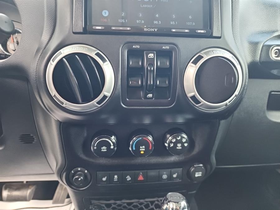 2016 Jeep Wrangler Unlimited 4WD 4dr Sahara, available for sale in Islip, New York | L.I. Auto Gallery. Islip, New York 2016 Jeep Wrangler Unlimited 4WD 4dr Sahara, available for sale in Islip, New York | L.I. Auto Gallery. Islip, New York