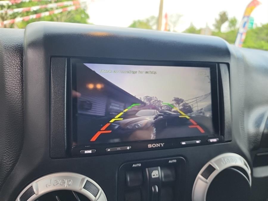 2016 Jeep Wrangler Unlimited 4WD 4dr Sahara, available for sale in Islip, New York | L.I. Auto Gallery. Islip, New York 2016 Jeep Wrangler Unlimited 4WD 4dr Sahara, available for sale in Islip, New York | L.I. Auto Gallery. Islip, New York