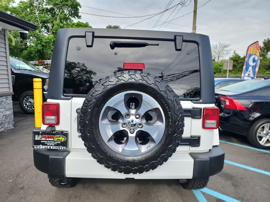 2016 Jeep Wrangler Unlimited 4WD 4dr Sahara, available for sale in Islip, New York | L.I. Auto Gallery. Islip, New York 2016 Jeep Wrangler Unlimited 4WD 4dr Sahara, available for sale in Islip, New York | L.I. Auto Gallery. Islip, New York