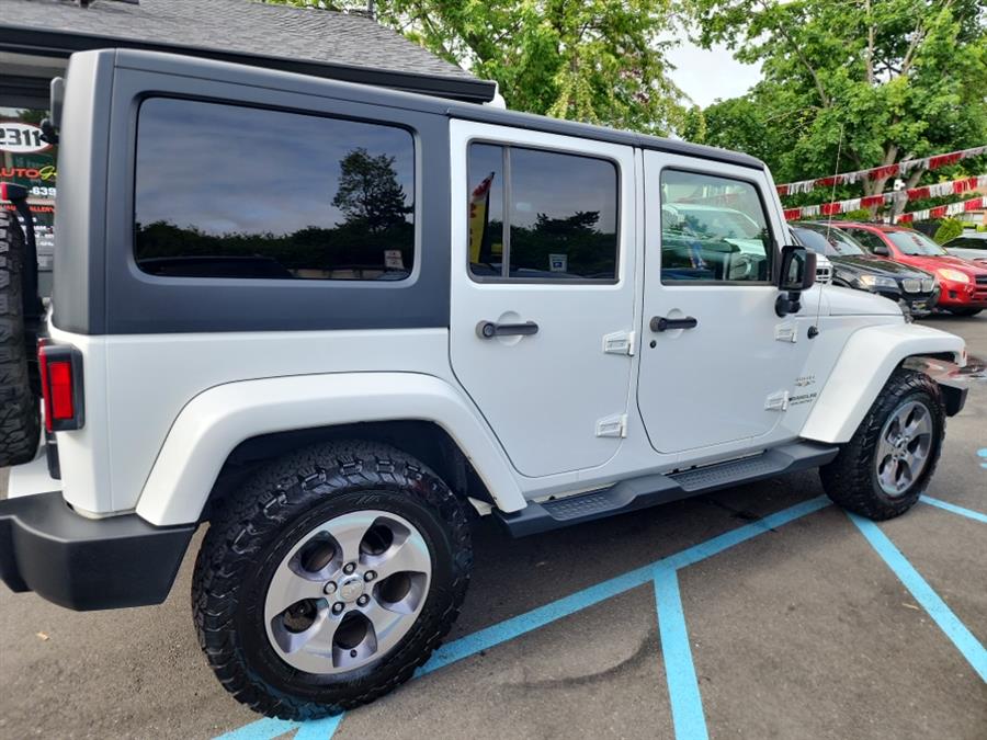 2016 Jeep Wrangler Unlimited 4WD 4dr Sahara, available for sale in Islip, New York | L.I. Auto Gallery. Islip, New York 2016 Jeep Wrangler Unlimited 4WD 4dr Sahara, available for sale in Islip, New York | L.I. Auto Gallery. Islip, New York