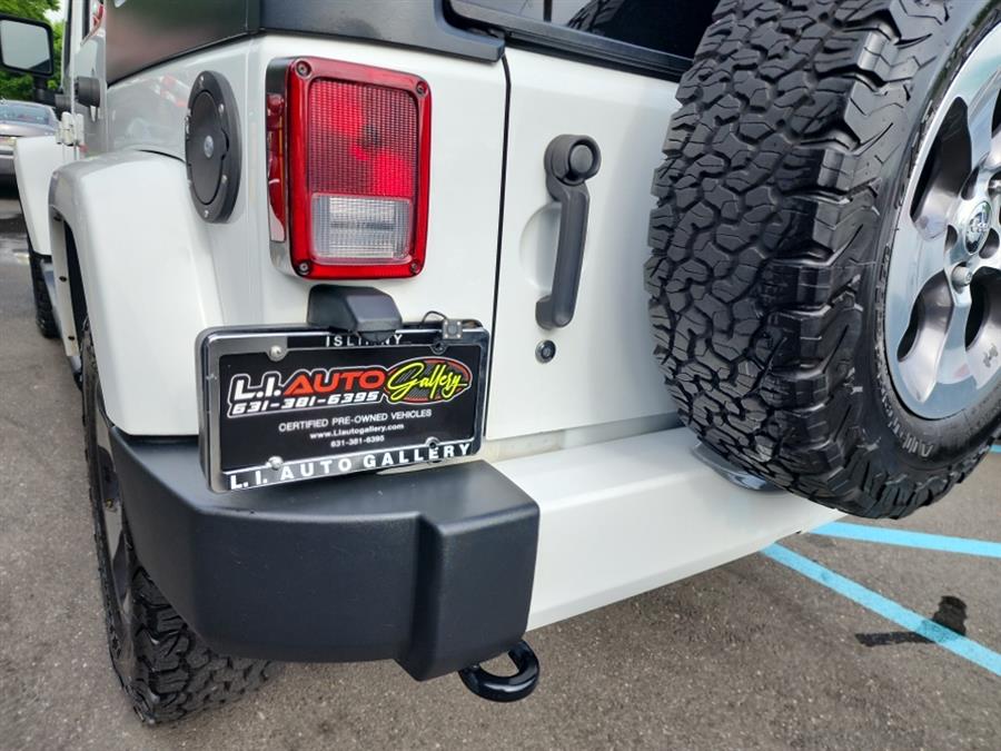 2016 Jeep Wrangler Unlimited 4WD 4dr Sahara, available for sale in Islip, New York | L.I. Auto Gallery. Islip, New York 2016 Jeep Wrangler Unlimited 4WD 4dr Sahara, available for sale in Islip, New York | L.I. Auto Gallery. Islip, New York