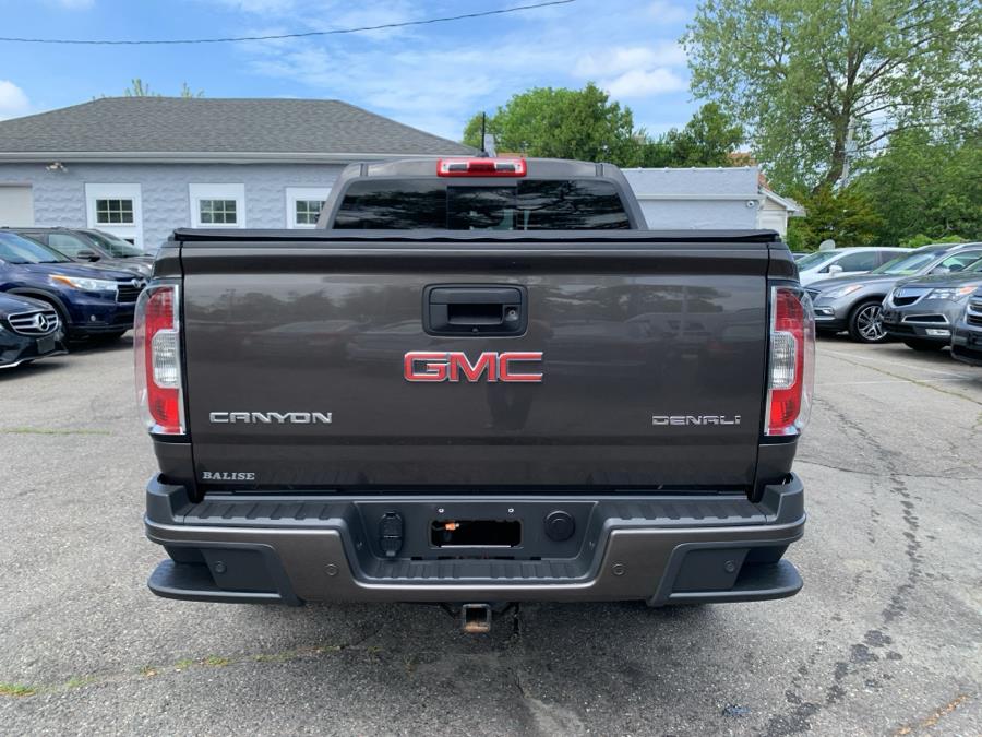 2019 GMC Canyon 4WD Crew Cab 128.3" Denali, available for sale in Springfield, Massachusetts | Absolute Motors Inc. Springfield, Massachusetts 2019 GMC Canyon 4WD Crew Cab 128.3" Denali, available for sale in Springfield, Massachusetts | Absolute Motors Inc. Springfield, Massachusetts