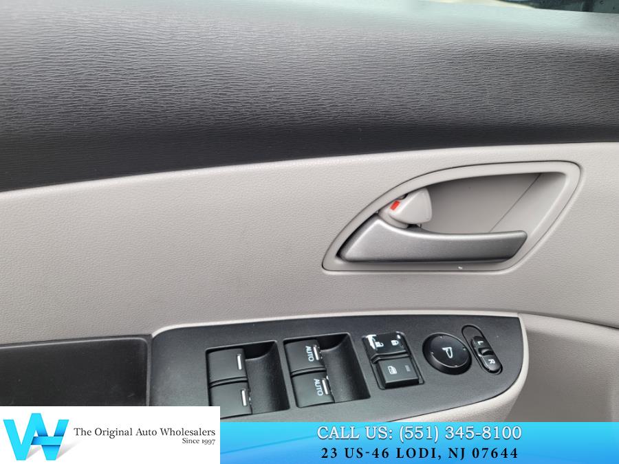 2012 Honda Odyssey 5dr EX-L w/Navi, available for sale in Lodi, New Jersey | AW Auto & Truck Wholesalers, Inc. Lodi, New Jersey 2012 Honda Odyssey 5dr EX-L w/Navi, available for sale in Lodi, New Jersey | AW Auto & Truck Wholesalers, Inc. Lodi, New Jersey