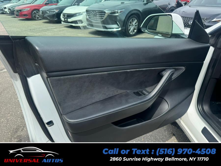 2021 Tesla Model 3 Long Range AWD, available for sale in Bellmore, New York | Universal Autos. Bellmore, New York 2021 Tesla Model 3 Long Range AWD, available for sale in Bellmore, New York | Universal Autos. Bellmore, New York