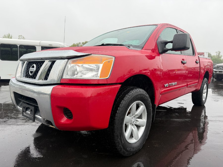 2012 Nissan Titan 4WD Crew Cab SWB SV, available for sale in Ortonville, Michigan | Marsh Auto Sales LLC. Ortonville, Michigan