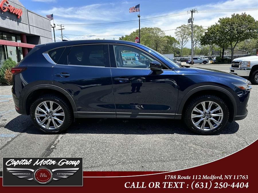 2021 Mazda CX-5 Grand Touring FWD, available for sale in Medford, New York | Capital Motor Group Inc. Medford, New York 2021 Mazda CX-5 Grand Touring FWD, available for sale in Medford, New York | Capital Motor Group Inc. Medford, New York