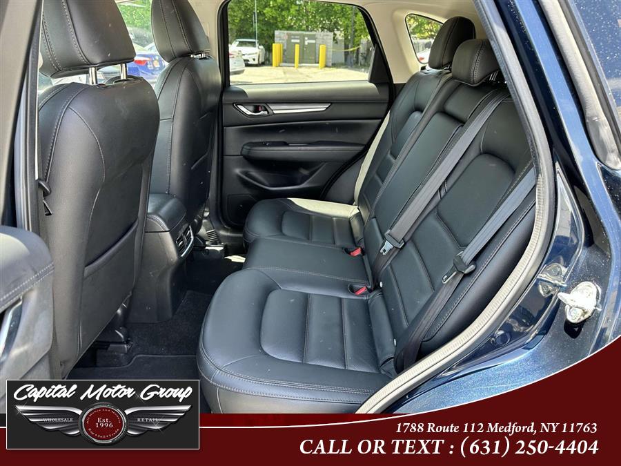 2021 Mazda CX-5 Grand Touring FWD, available for sale in Medford, New York | Capital Motor Group Inc. Medford, New York 2021 Mazda CX-5 Grand Touring FWD, available for sale in Medford, New York | Capital Motor Group Inc. Medford, New York