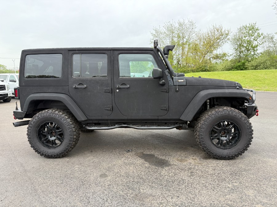 2016 Jeep Wrangler Unlimited 4WD 4dr Rubicon, available for sale in Ortonville, Michigan | Marsh Auto Sales LLC. Ortonville, Michigan 2016 Jeep Wrangler Unlimited 4WD 4dr Rubicon, available for sale in Ortonville, Michigan | Marsh Auto Sales LLC. Ortonville, Michigan
