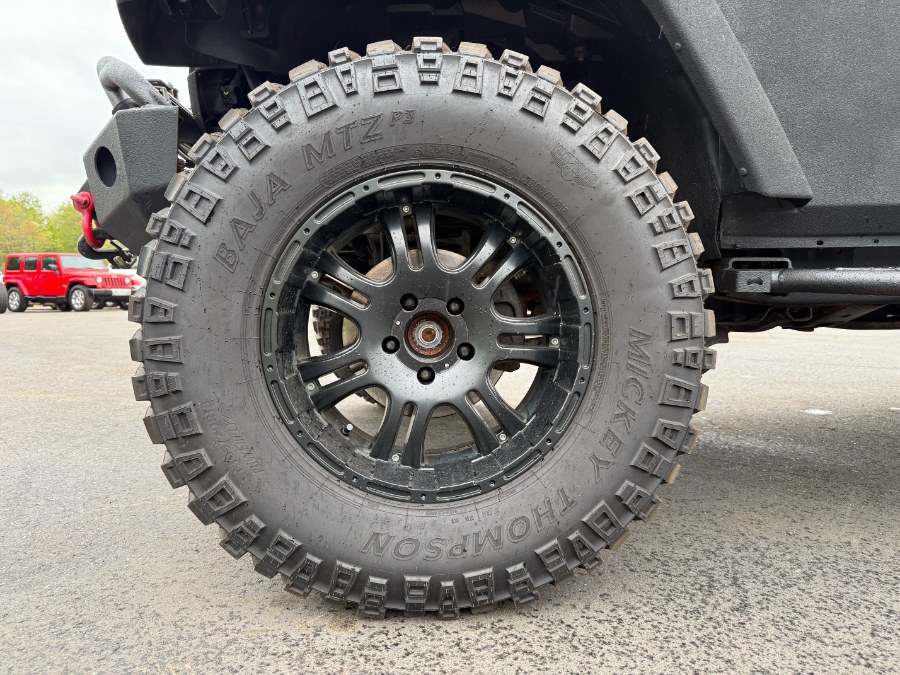 2016 Jeep Wrangler Unlimited 4WD 4dr Rubicon, available for sale in Ortonville, Michigan | Marsh Auto Sales LLC. Ortonville, Michigan 2016 Jeep Wrangler Unlimited 4WD 4dr Rubicon, available for sale in Ortonville, Michigan | Marsh Auto Sales LLC. Ortonville, Michigan