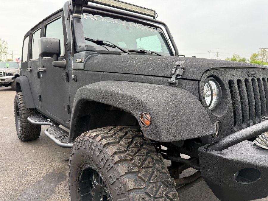 2016 Jeep Wrangler Unlimited 4WD 4dr Rubicon, available for sale in Ortonville, Michigan | Marsh Auto Sales LLC. Ortonville, Michigan 2016 Jeep Wrangler Unlimited 4WD 4dr Rubicon, available for sale in Ortonville, Michigan | Marsh Auto Sales LLC. Ortonville, Michigan