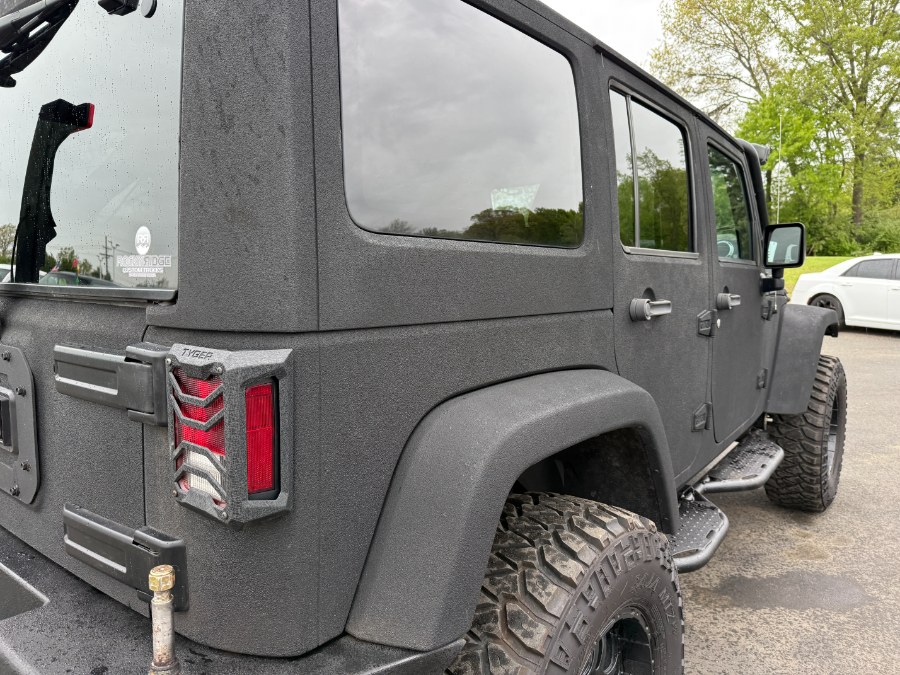 2016 Jeep Wrangler Unlimited 4WD 4dr Rubicon, available for sale in Ortonville, Michigan | Marsh Auto Sales LLC. Ortonville, Michigan 2016 Jeep Wrangler Unlimited 4WD 4dr Rubicon, available for sale in Ortonville, Michigan | Marsh Auto Sales LLC. Ortonville, Michigan