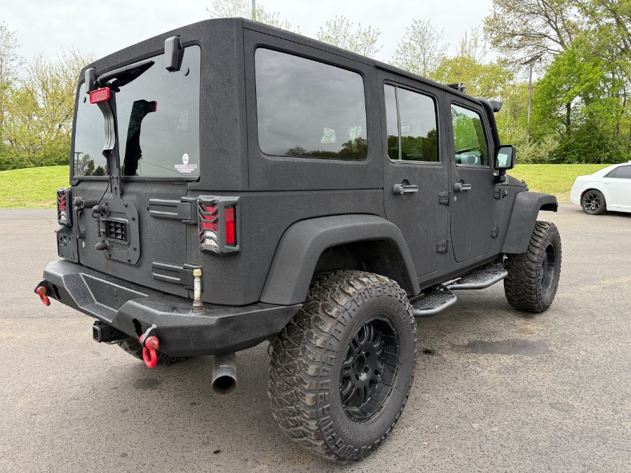 2016 Jeep Wrangler Unlimited 4WD 4dr Rubicon, available for sale in Ortonville, Michigan | Marsh Auto Sales LLC. Ortonville, Michigan 2016 Jeep Wrangler Unlimited 4WD 4dr Rubicon, available for sale in Ortonville, Michigan | Marsh Auto Sales LLC. Ortonville, Michigan