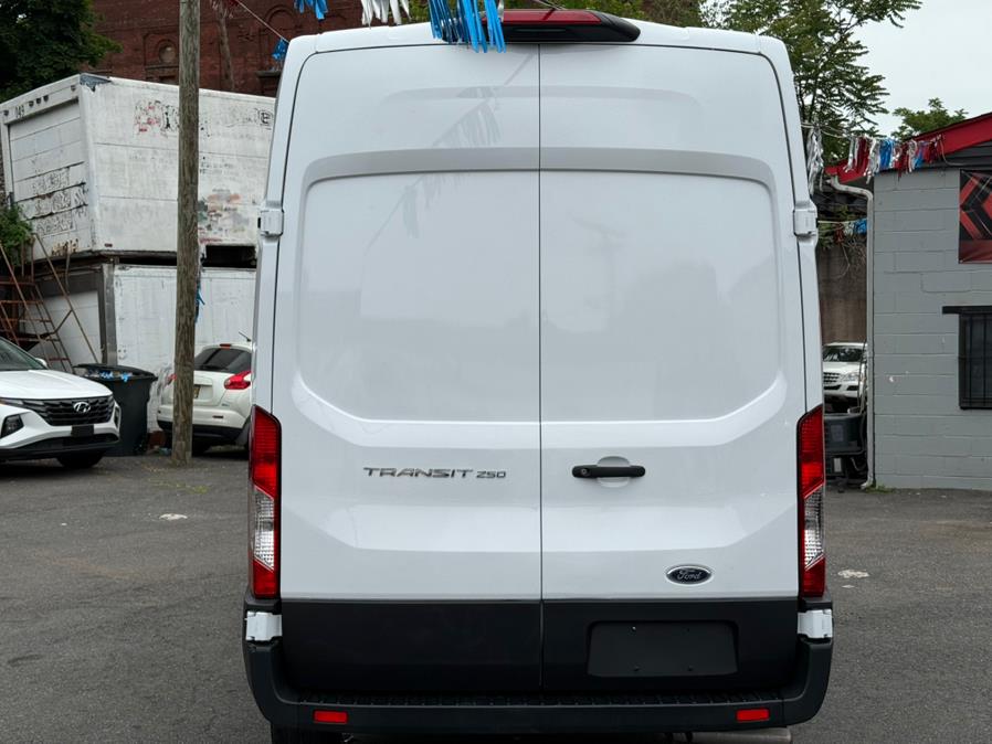 2023 Ford Transit Cargo Van T-250 148" Hi Rf 9070 GVWR RWD, available for sale in Paterson, New Jersey | Champion of Paterson. Paterson, New Jersey 2023 Ford Transit Cargo Van T-250 148" Hi Rf 9070 GVWR RWD, available for sale in Paterson, New Jersey | Champion of Paterson. Paterson, New Jersey