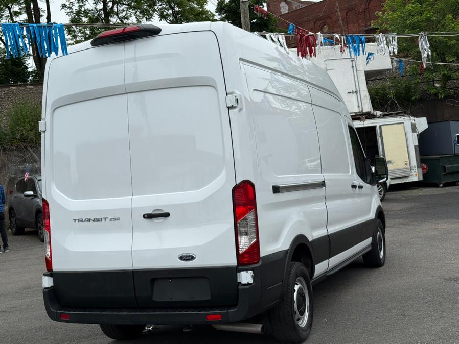 2023 Ford Transit Cargo Van T-250 148" Hi Rf 9070 GVWR RWD, available for sale in Paterson, New Jersey | Champion of Paterson. Paterson, New Jersey 2023 Ford Transit Cargo Van T-250 148" Hi Rf 9070 GVWR RWD, available for sale in Paterson, New Jersey | Champion of Paterson. Paterson, New Jersey