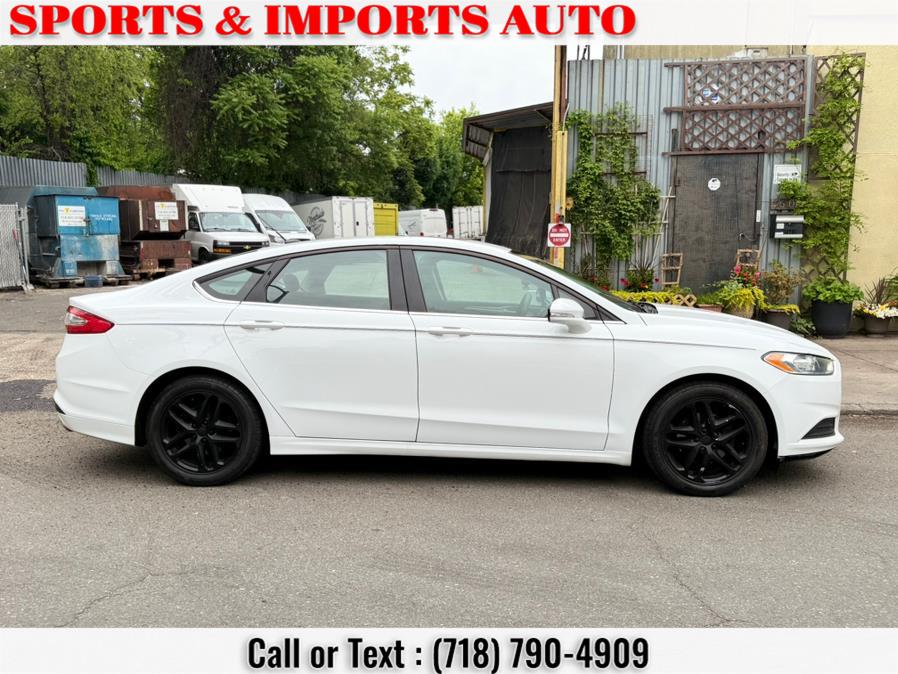 2014 Ford Fusion 4dr Sdn SE FWD, available for sale in Brooklyn, New York | Sports & Imports Auto Inc. Brooklyn, New York 2014 Ford Fusion 4dr Sdn SE FWD, available for sale in Brooklyn, New York | Sports & Imports Auto Inc. Brooklyn, New York