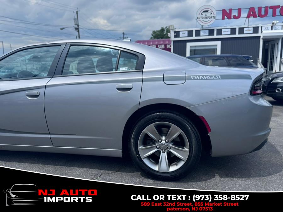 2016 Dodge Charger 4dr Sdn SXT RWD, available for sale in Paterson, New Jersey | NJ Auto Imports. Paterson, New Jersey 2016 Dodge Charger 4dr Sdn SXT RWD, available for sale in Paterson, New Jersey | NJ Auto Imports. Paterson, New Jersey