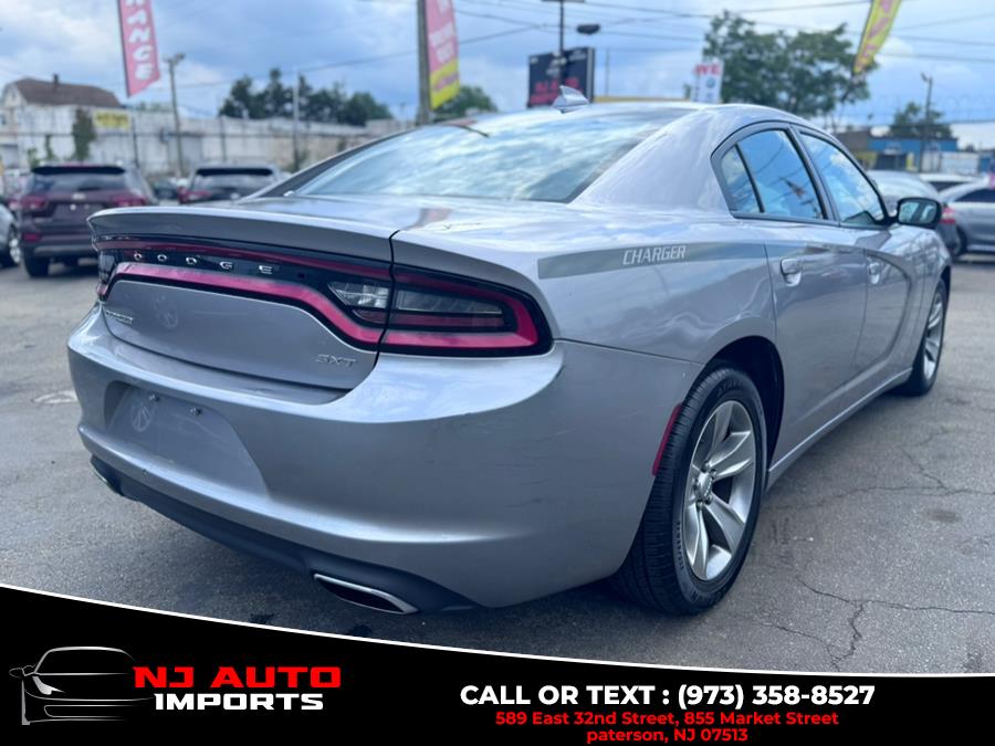 2016 Dodge Charger 4dr Sdn SXT RWD, available for sale in Paterson, New Jersey | NJ Auto Imports. Paterson, New Jersey 2016 Dodge Charger 4dr Sdn SXT RWD, available for sale in Paterson, New Jersey | NJ Auto Imports. Paterson, New Jersey