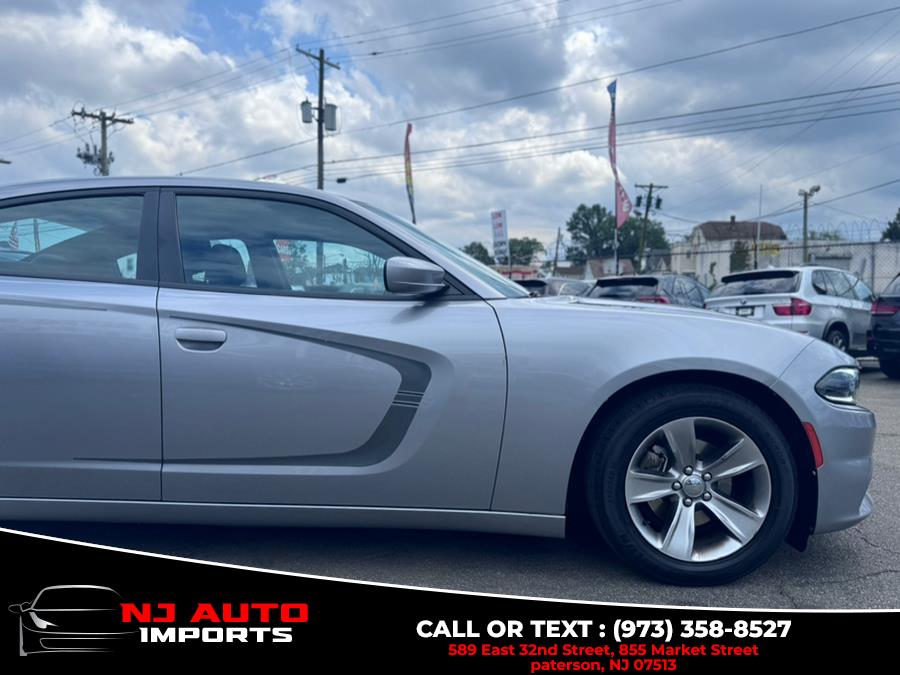 2016 Dodge Charger 4dr Sdn SXT RWD, available for sale in Paterson, New Jersey | NJ Auto Imports. Paterson, New Jersey 2016 Dodge Charger 4dr Sdn SXT RWD, available for sale in Paterson, New Jersey | NJ Auto Imports. Paterson, New Jersey