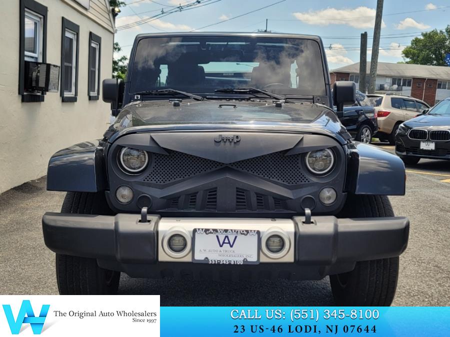 2014 Jeep Wrangler Unlimited 4WD 4dr Sahara, available for sale in Lodi, New Jersey | AW Auto & Truck Wholesalers, Inc. Lodi, New Jersey 2014 Jeep Wrangler Unlimited 4WD 4dr Sahara, available for sale in Lodi, New Jersey | AW Auto & Truck Wholesalers, Inc. Lodi, New Jersey