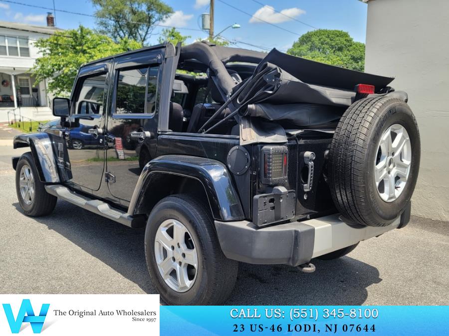 2014 Jeep Wrangler Unlimited 4WD 4dr Sahara, available for sale in Lodi, New Jersey | AW Auto & Truck Wholesalers, Inc. Lodi, New Jersey 2014 Jeep Wrangler Unlimited 4WD 4dr Sahara, available for sale in Lodi, New Jersey | AW Auto & Truck Wholesalers, Inc. Lodi, New Jersey
