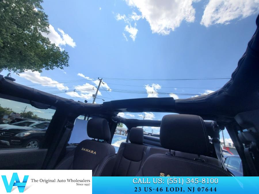 2014 Jeep Wrangler Unlimited 4WD 4dr Sahara, available for sale in Lodi, New Jersey | AW Auto & Truck Wholesalers, Inc. Lodi, New Jersey 2014 Jeep Wrangler Unlimited 4WD 4dr Sahara, available for sale in Lodi, New Jersey | AW Auto & Truck Wholesalers, Inc. Lodi, New Jersey