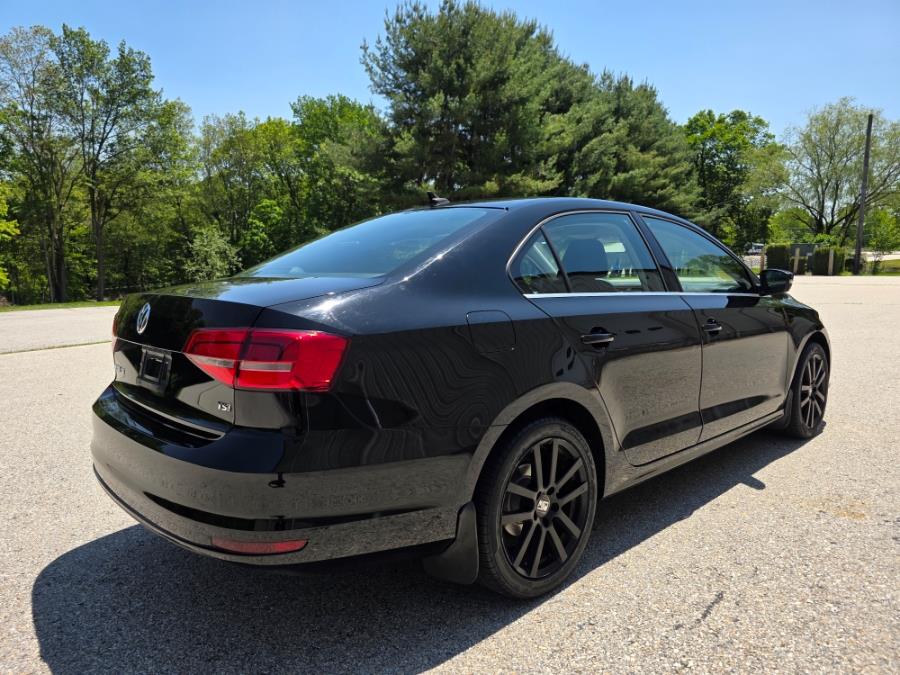 2015 Volkswagen Jetta Sedan 4dr Auto 1.8T SE w/Connectivity/Navigation PZEV, available for sale in Dudley, Massachusetts | Zoom Auto Service. Dudley, Massachusetts 2015 Volkswagen Jetta Sedan 4dr Auto 1.8T SE w/Connectivity/Navigation PZEV, available for sale in Dudley, Massachusetts | Zoom Auto Service. Dudley, Massachusetts