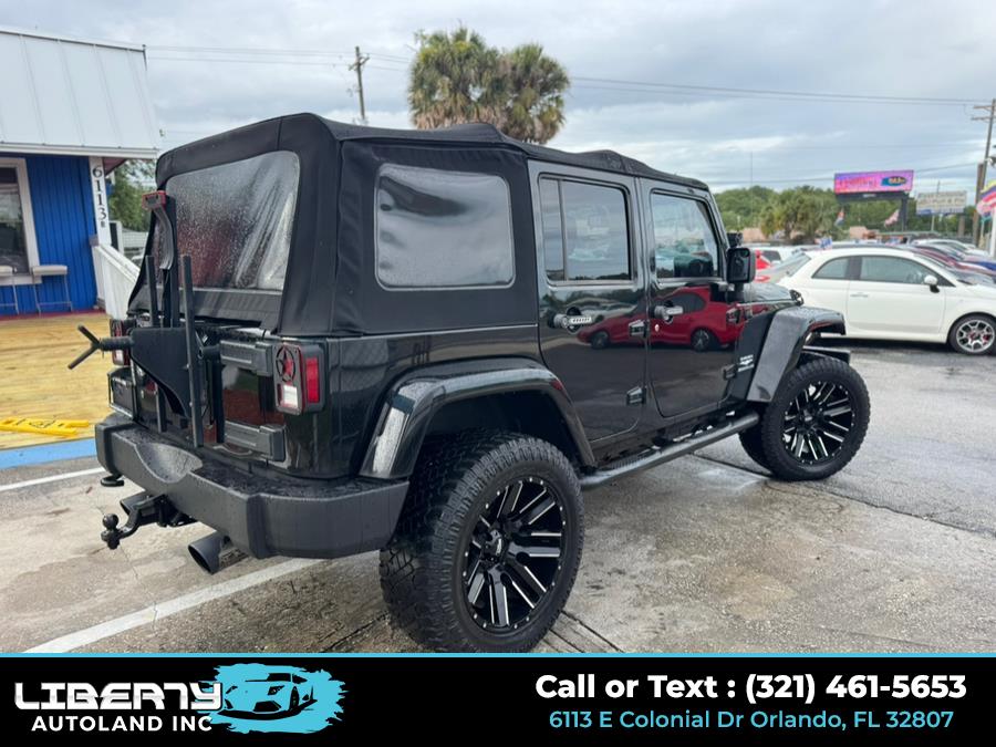2015 Jeep Wrangler Unlimited 4WD 4dr Freedom Edition *Ltd Avail*, available for sale in Orlando, Florida | Liberty Autoland LLC. Orlando, Florida 2015 Jeep Wrangler Unlimited 4WD 4dr Freedom Edition *Ltd Avail*, available for sale in Orlando, Florida | Liberty Autoland LLC. Orlando, Florida