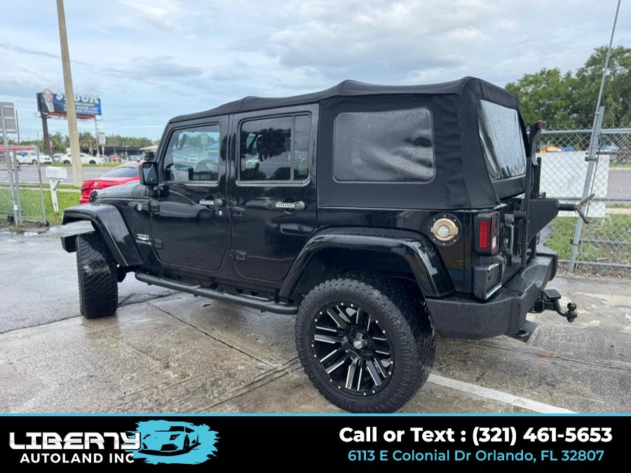 2015 Jeep Wrangler Unlimited 4WD 4dr Freedom Edition *Ltd Avail*, available for sale in Orlando, Florida | Liberty Autoland LLC. Orlando, Florida 2015 Jeep Wrangler Unlimited 4WD 4dr Freedom Edition *Ltd Avail*, available for sale in Orlando, Florida | Liberty Autoland LLC. Orlando, Florida