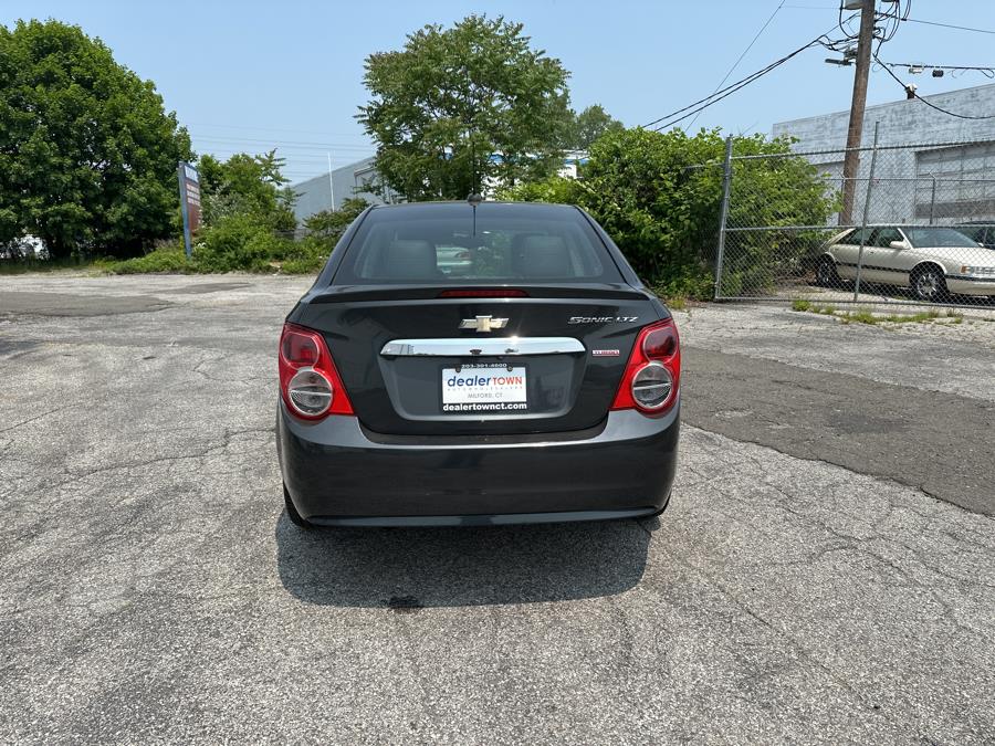 2015 Chevrolet Sonic 4dr Sdn Auto LTZ, available for sale in Milford, Connecticut | Dealertown Auto Wholesalers. Milford, Connecticut 2015 Chevrolet Sonic 4dr Sdn Auto LTZ, available for sale in Milford, Connecticut | Dealertown Auto Wholesalers. Milford, Connecticut