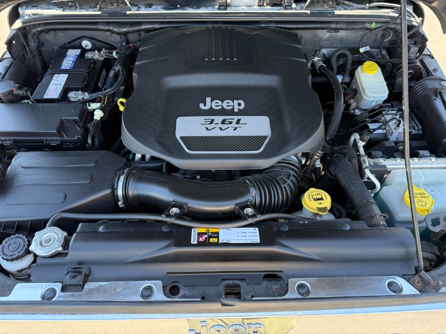 2013 Jeep Wrangler Unlimited 4WD 4dr Sahara, available for sale in Ortonville, Michigan | Marsh Auto Sales LLC. Ortonville, Michigan 2013 Jeep Wrangler Unlimited 4WD 4dr Sahara, available for sale in Ortonville, Michigan | Marsh Auto Sales LLC. Ortonville, Michigan