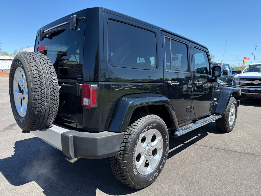 2013 Jeep Wrangler Unlimited 4WD 4dr Sahara, available for sale in Ortonville, Michigan | Marsh Auto Sales LLC. Ortonville, Michigan 2013 Jeep Wrangler Unlimited 4WD 4dr Sahara, available for sale in Ortonville, Michigan | Marsh Auto Sales LLC. Ortonville, Michigan