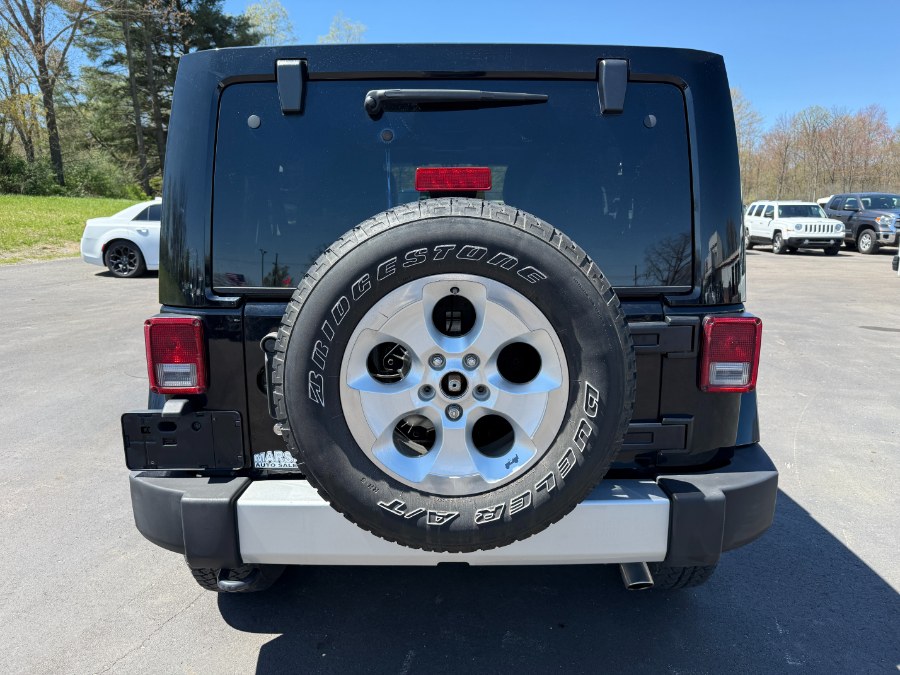 2013 Jeep Wrangler Unlimited 4WD 4dr Sahara, available for sale in Ortonville, Michigan | Marsh Auto Sales LLC. Ortonville, Michigan 2013 Jeep Wrangler Unlimited 4WD 4dr Sahara, available for sale in Ortonville, Michigan | Marsh Auto Sales LLC. Ortonville, Michigan