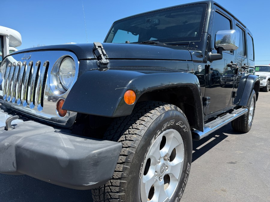 2013 Jeep Wrangler Unlimited 4WD 4dr Sahara, available for sale in Ortonville, Michigan | Marsh Auto Sales LLC. Ortonville, Michigan 2013 Jeep Wrangler Unlimited 4WD 4dr Sahara, available for sale in Ortonville, Michigan | Marsh Auto Sales LLC. Ortonville, Michigan