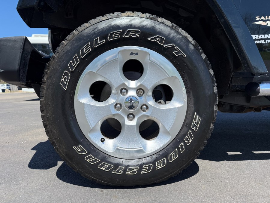 2013 Jeep Wrangler Unlimited 4WD 4dr Sahara, available for sale in Ortonville, Michigan | Marsh Auto Sales LLC. Ortonville, Michigan 2013 Jeep Wrangler Unlimited 4WD 4dr Sahara, available for sale in Ortonville, Michigan | Marsh Auto Sales LLC. Ortonville, Michigan