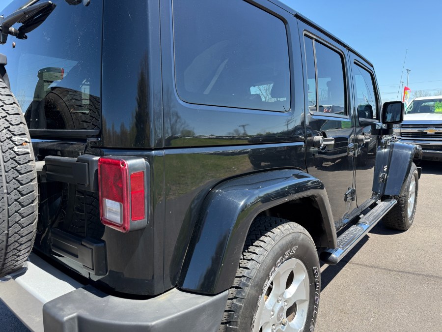 2013 Jeep Wrangler Unlimited 4WD 4dr Sahara, available for sale in Ortonville, Michigan | Marsh Auto Sales LLC. Ortonville, Michigan 2013 Jeep Wrangler Unlimited 4WD 4dr Sahara, available for sale in Ortonville, Michigan | Marsh Auto Sales LLC. Ortonville, Michigan